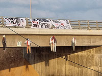 Куклы, изображающие людей, появились на мосту над 2-м шоссе. Подробности