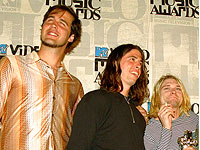 Группа Nirvana: (слева направо) Крист Новоселич, Дэйв Грол и Курт Кобейн. 1993 год