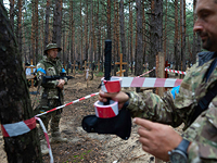 Полиция Украины: в деоккупированной территории Харьковской области найдены могилы и тела сотен погибших