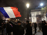 Торжества и беспорядки в Париже после победы Франции в полуфинале ЧМ по футболу. Фоторепортаж