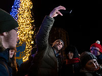 Рождество в Украине: в Киеве, на линии фронта и в оккупированном Мариуполе. Фоторепортаж