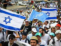 Тысячи израильтян принимают участие в марше в Эвьятар