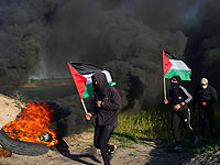 В секторе Газы, на границе с Израилем, проходит Марш с палестинским флагами