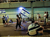 Демонстранты в районе перекрестка Каплан в Тель-Авиве. 29 июля 2023 года