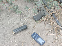 Оружие и телефон террориста