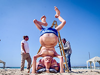 Бен-Гурион, стоящий на голове, вернулся на пляж Тель-Авива