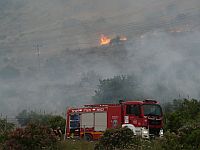 Сильный лесной пожар около Кирьят-Шмоны после ракетного обстрела из Ливана
