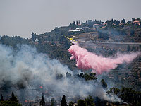 Пожарные самолеты прибыли для тушения возгорания возле Музея Израиля