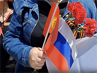 Сотрудница "Русского дома" в Оше подозревается в вербовке наемников для войны с Украиной