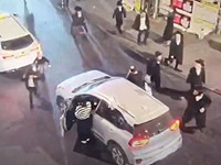 В Иерусалиме во время сирены ультраортодокс сорвал флаг с остановившейся машины