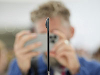 Apple представила новый, более тонкий iPhone на ежегодной презентации продуктов