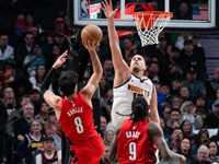 НБА. Дени Авдия набрал 23 очка. "Портленд" победил "Денвер"