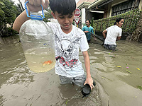 Последствия тайфуна "Калмаэги" на Филиппинах. Фоторепортаж