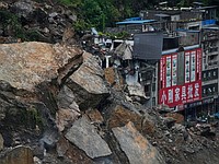 Разрушительный оползень на юго-западе Китае: множество жертв. Фоторепортаж