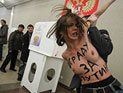 Активистки FEMEN, устроившие "топлесс-акцию" в Академии наук, разминулись с четой Путиных