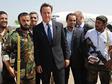 Премьер-министр Великобритании Дэвид Кэмерон во время визита в "новую Ливию". Сентябрь 2011 года