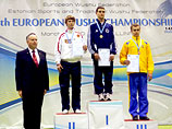 Даниил Ковалев (на высшей ступени пьедестала почета) на чемпионате Европы. Таллин, март 2012 года