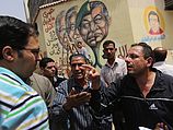 Египтяне спорят о достоинствах соперничающих кандидатов в президенты