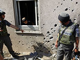 После ракетного обстрела одного из израильских поселков, расположенных около Газы. Июнь 2012 года