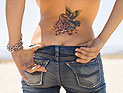 Законопроект: татуировщики обязаны предупреждать девушек об опасности тату на пояснице