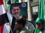 Активисты ХАМАС в Газе приветствуют избрание нового президента Египта Мухаммада Мурси. Июнь 2012 года