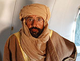 Саиф аль-Ислам Каддафи на борту "Ан-32" после ареста. 19 ноября 2011 года