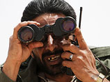 Ливийские боевики (автор снимка Крис Хондрос был убит в Ливии в апреле 2011 года)