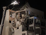 После попадания ракеты в жилой дом в Ришон ле-Ционе. 20 ноября 2012 года