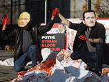 Нью-Йорк. Акция протеста против поддержки президентом России Владимиром Путиным режима президента Сирии Башара Асада