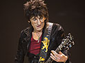 Гитарист Rolling Stones Рон Вуд женился на 34-летней Салли Хэмфрис