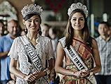 Оливия Кульпо, "Мисс Вселенная 2012", совершила первый "королевский" вояж