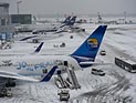 Сильные снегопады привели к транспортному коллапсу в Европе