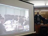 Слушание показаний Йоси Ольмерта с помощью видео-конференции. 7 мая 2013 года