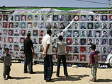 Портреты "героев палестинского сопротивления", сидящих в израильских тюрьмах