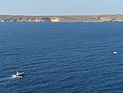 Число жертв первого кораблекрушения в районе Лампедузы увеличилось
