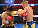 Бокс: Ломаченко в первом бою нокаутировал соперника и стал интернациональным чемпионом