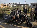 "Тук-тук", который боевики "Исламского джихада" использовали для перевозки миномета и снарядов. Около Хан-Юниса, 9 января 2014 года