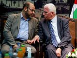 Заместитель политбюро ХАМАС Муса Абу Марзук и представитель ООП Аззам аль-Ахмад. Газа, 23 апреля 2014 года