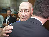 Эхуд Ольмерт в зале суда. 13 мая 2014 года