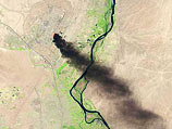 Пожар на нефтеперерабатывающем заводе в Байджи, подожженном боевиками "Исламского государства в Ираке и Леванте"