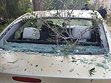  Автомобиль, поврежденный 7 июля 2014 года в результате ракетного обстрела в районе Эшколь