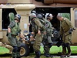 Раненых военнослужащих ЦАХАЛа доставляют в больницу "Сорока" в Беэр-Шеве. 19 июля 2014 г.
