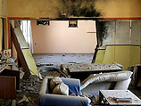 После попадания ракеты в дом в Эшколе. 21 августа 2014 года