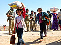 Курды пересекают сирийско-турецкую границу