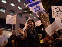 В южном Тель-Авиве проходит акция протеста против закрытия лагеря для нелегалов "Холот"