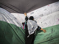 Палестинцы штурмуют Книгу рекордов Гиннеса: 25.000 подписей на 66-метровом флаге