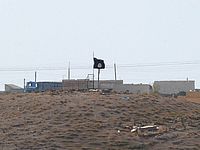 Захваченный ИГ объект в районе Кобани
