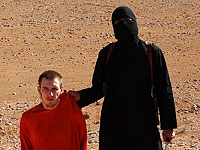 Палач "Исламского государства" казнил американца Питера Кэссига, принявшего ислам