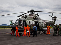 Индонезийские спасатели. 29 декабря 2014 года