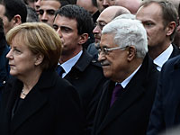 Канцлер Германии Ангела Меркель принимает участие в "Республиканском марше". Париж, 11 января 2015 года